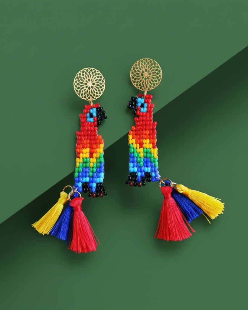 Colorful beaded parrot Kawami earrings with tassels on a green background