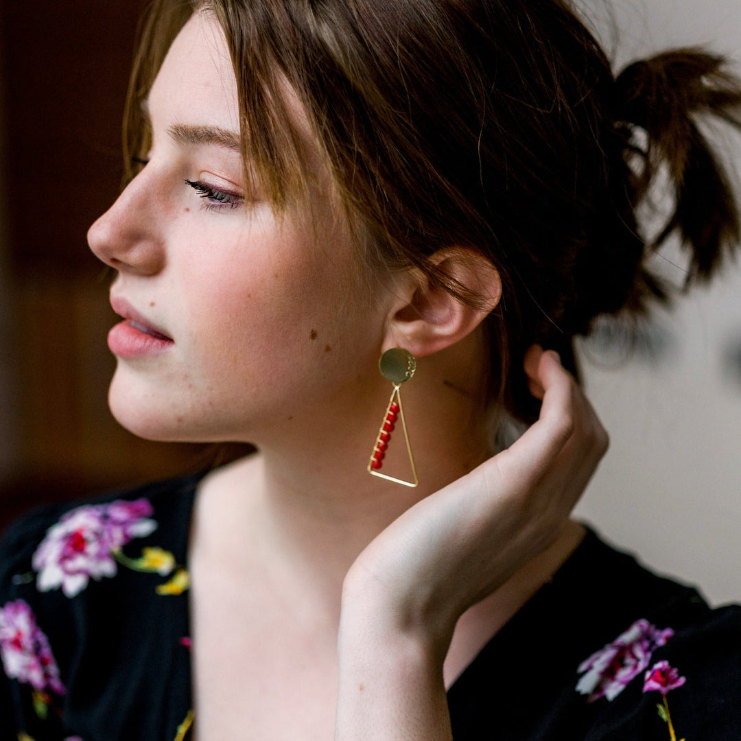 Red University Graduation Dangle Earrings, Triangle Shaped filled with glass beads. Size in width is 0.75 inches x 2 inches in length. Hypoallergenic, Handmade, Premier Quality, Super Lightweight. Perfect for grad gifts. #color_red