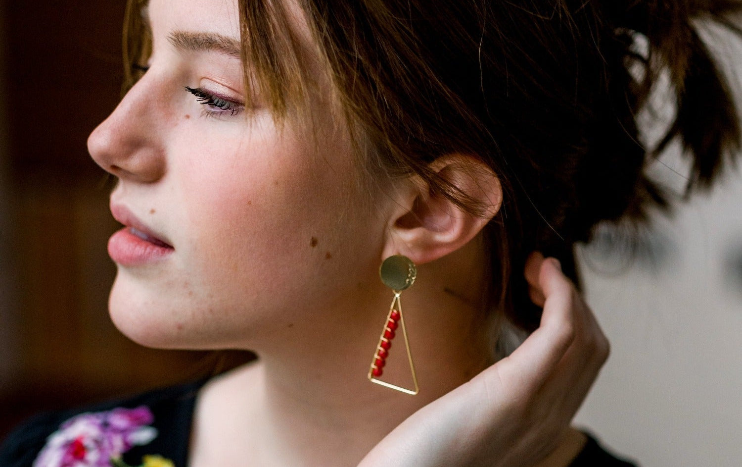 Red University Graduation Dangle Earrings, Triangle Shaped filled with glass beads. Size in width is 0.75 inches x 2 inches in length. Hypoallergenic, Handmade, Premier Quality, Super Lightweight. Perfect for grad gifts. #color_red