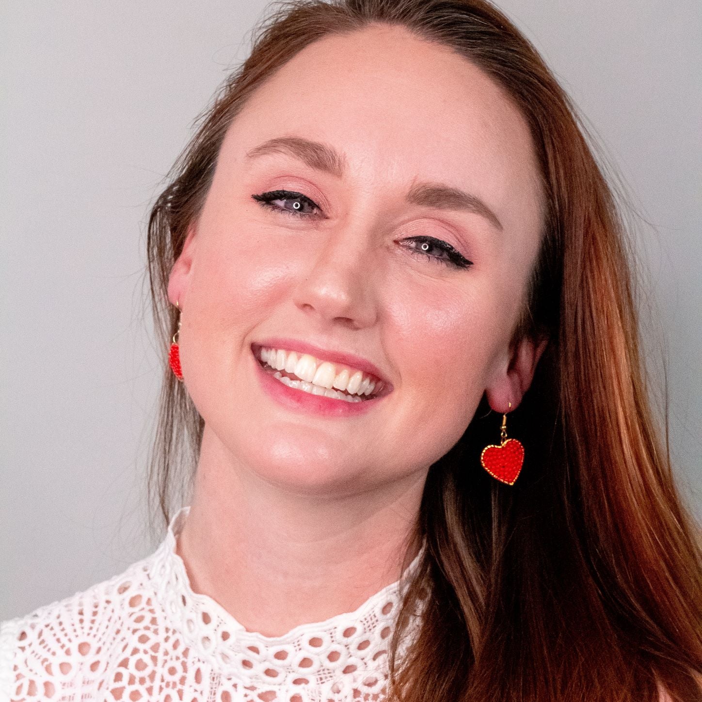 Red Heart Dangle Earrings, heart Shaped filled with glass beads. Size in width is 0.75 inches x 1.5 inches in length. Hypoallergenic, Handmade, Premier Quality, Super Lightweight. Perfect for gifts #style_earrings-only